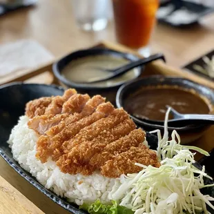 a plate of rice and vegetables
