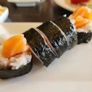 sushi rolls on a white plate