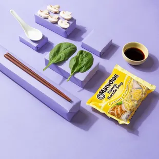 a variety of food items on a purple surface