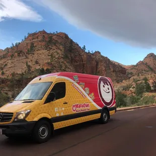 a delivery van on a mountain road