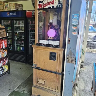 a vending machine with a purple light