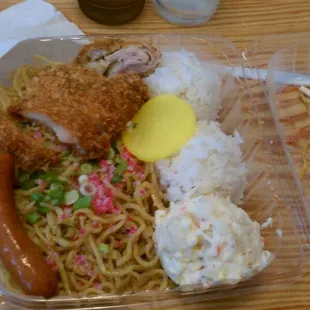 Bento...fried noodles, chicken katsu, spam, arabiki hot dog, 2 scoop rice, 1 scoop mac/pot salad, and daikon...only $7...SO ONO!