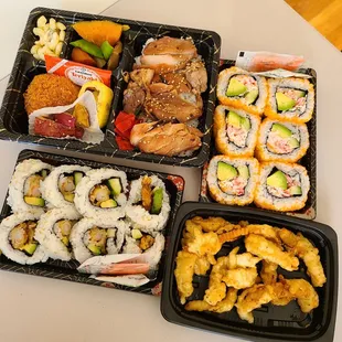 a variety of sushi and rolls