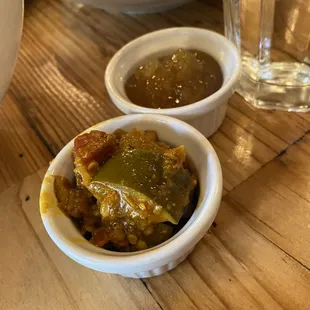 bowls of food on a wooden table