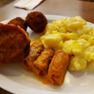 Hot potato salad, cabbage rolls, stuffed peppers, and chicken meatballs (picture does no justices... the portions are HUGE)