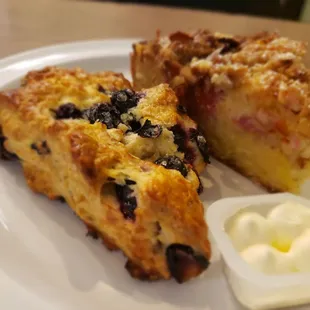 Blueberry scone with butter and raspberry coffee cake