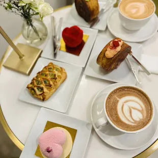 Ordered strawberry Tart, spiral croissant, Rose chocolate Mousse, Pink Rose latte and Mocha latte.