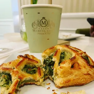 Excellent selection of some amazing pastries  This is what I had for breakfast - Spinach Feta Croissant &amp; a Rose Latte.