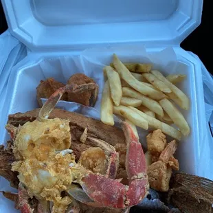 Mullet Combo Fried Shrimp  Fried Blue Crab Hushpuppies  White Bread  Fries