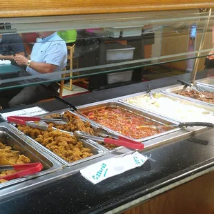 A photo of the food, to balance out the lovely ones of the customers.  This is the first aisle of three.