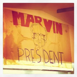 a political sign on a wall