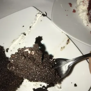 a half eaten chocolate cake