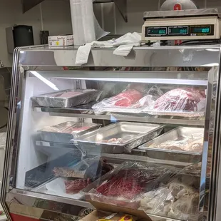 Meat counter in back
