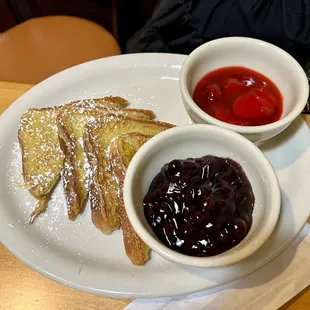 French toast with blueberry compote and strawberry compote