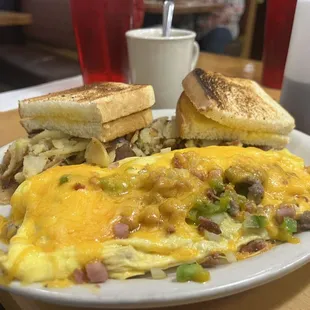 Hillbilly Omelette with home fries and sourdough toast