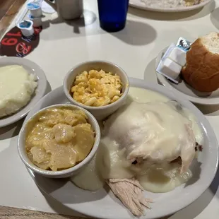 Turkey dinner, mashed potatoes, cheesy potatoes, Mac and cheese.