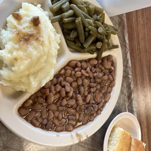 Pintos, green beans, mashed potatoes and cornbread