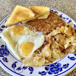 Sausage patty with two eggs breakfast