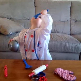 a baby dressed in a costume