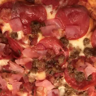 Amazing Meat Pizza with a perfect thin crust! Loaded with tasty ham,sausage and pepperoni!