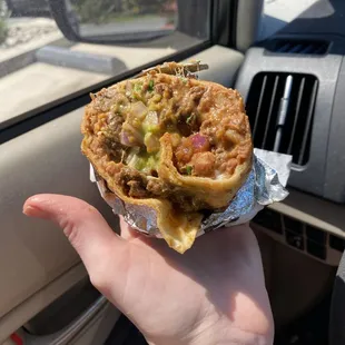 Handful of half a carne asada burrito