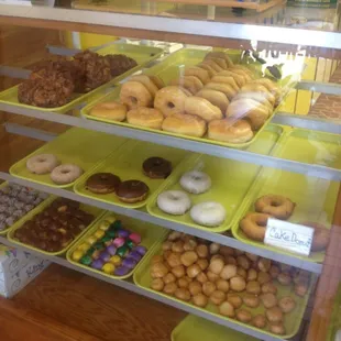a display of various types of donuts