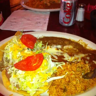 Mary Lou&apos;s plate . Carne guisada , two cheese enchildas, rice, picadillo taco, and bean and cheese chalupa