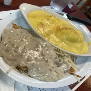 Eggs Benedict with side of Hash-browns smothered in gravy