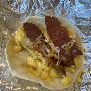 Breakfast Taco - eggs, potatoes, bacon, cheddar cheese. Lacked flavor.