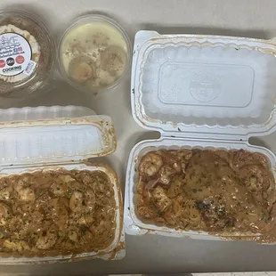 Chicken pasta minus potatoes, salmon and shrimp pasta, vanilla wafer pudding, peach cobbler cake.