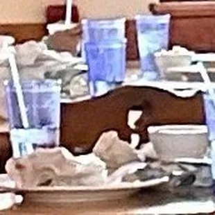 There were lots of table choices but they all had dirty dishes on them.