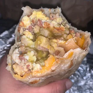 Bacon breakfast burrito with green salsa no potato