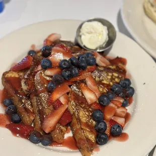 Brioche French Toast with strawberries and blueberries  *ask for a side of whipped cream*