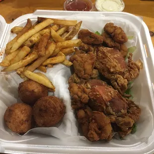 Soft shell crab meal with side of oysters.