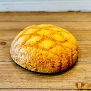 a freshly baked bread on a wooden table