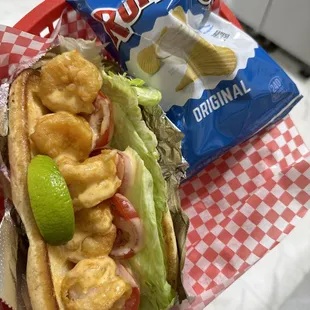 a bag of chips and a sandwich