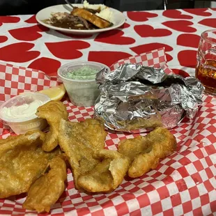 Bluegill on a Friday. Korbel next to it and a Mary's signature dish behind.