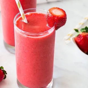 two glasses of strawberry smoothie