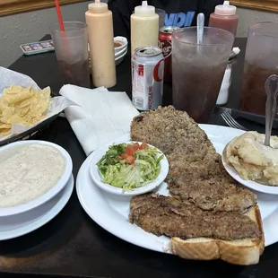 Medium size Chicken Fried Steak w/gravy, mashed potatoes and side salad.