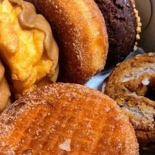 Double Cruller, double apple cinnamon filled, chocolate cake with peanuts, and a blueberry cake...donuts a plenty...