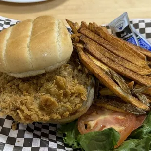 Hand breaded Chicken fried steak sandwich and fresh cut fries