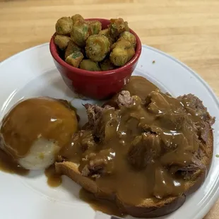 The small portion open face roast beef with mashed potatoes and fried okra