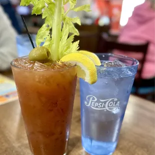 a bloody drink and a glass of water