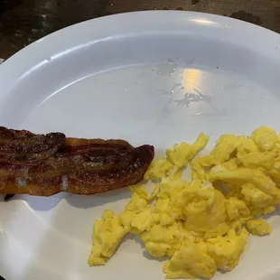 2 eggs scrambled with 2 strips of bacon