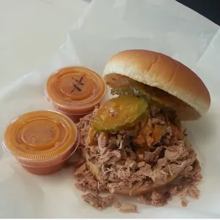 Shoulder sandwich with pickles and hot sauce not as good as it to be kinda dry &amp; bland