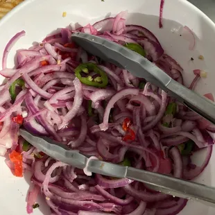 a bowl of onion salad