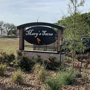 a sign for mary's tacos