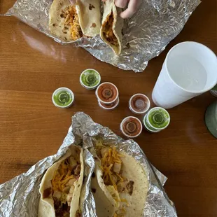 silent sean (potato bacon egg and cheese) and a macho sean (chorizo bean egg and cheese)