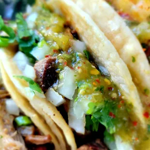 Asada taco with green sauce