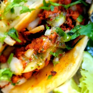 Al Pastor taco with green sauce